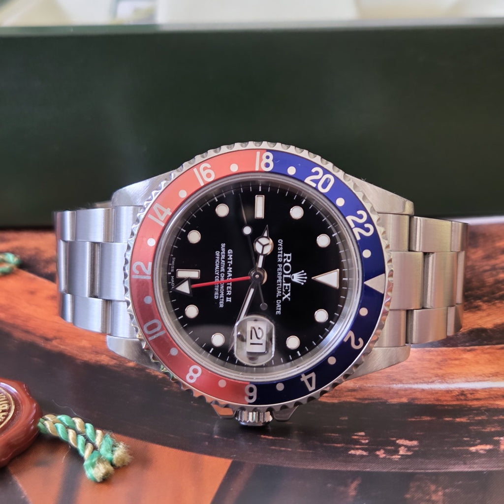 Rolex GMT-Master ii "Pepsi" 16710 - No Holes Case (2004) Full Set with original purchase receipt!