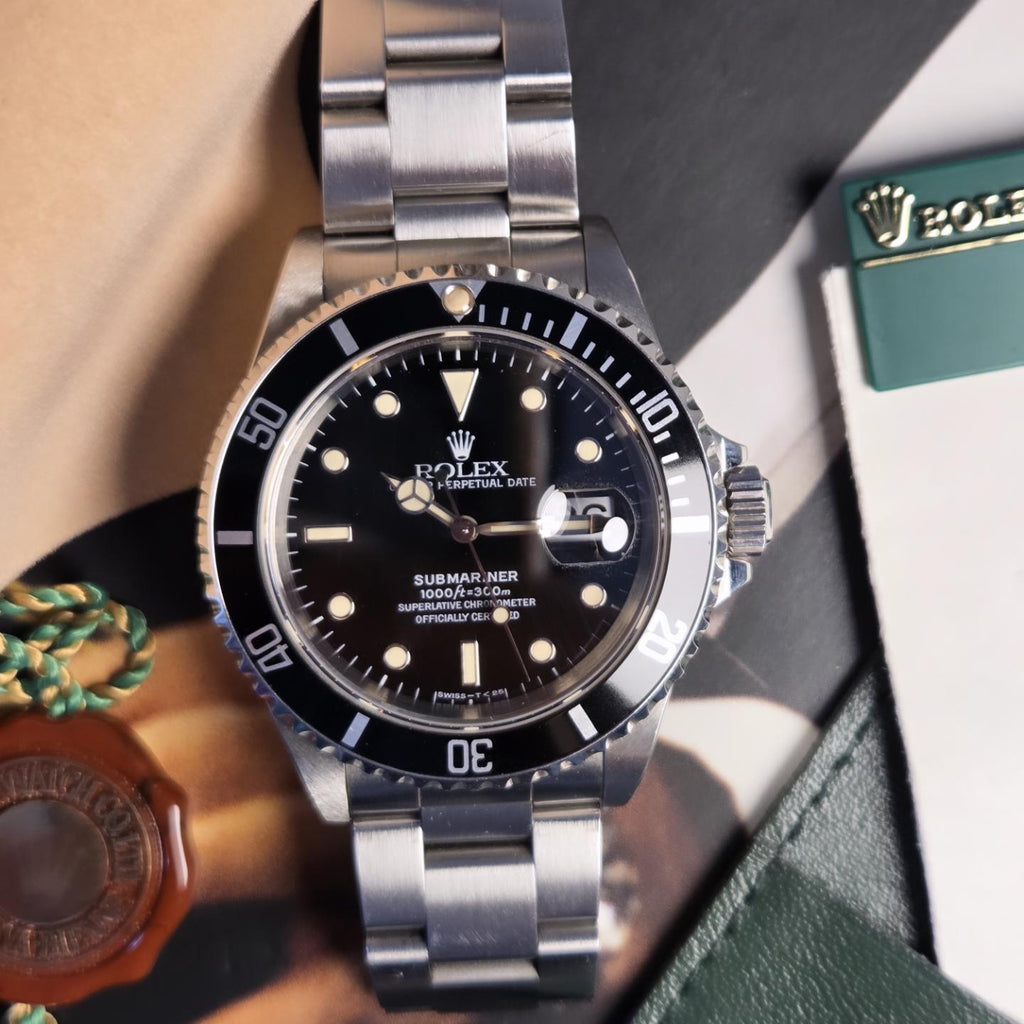 Rolex Submariner Date Ref. 16610 — “Tritium Pure” full Set 1996 - Un-polished - Double caseback stickers Intact!